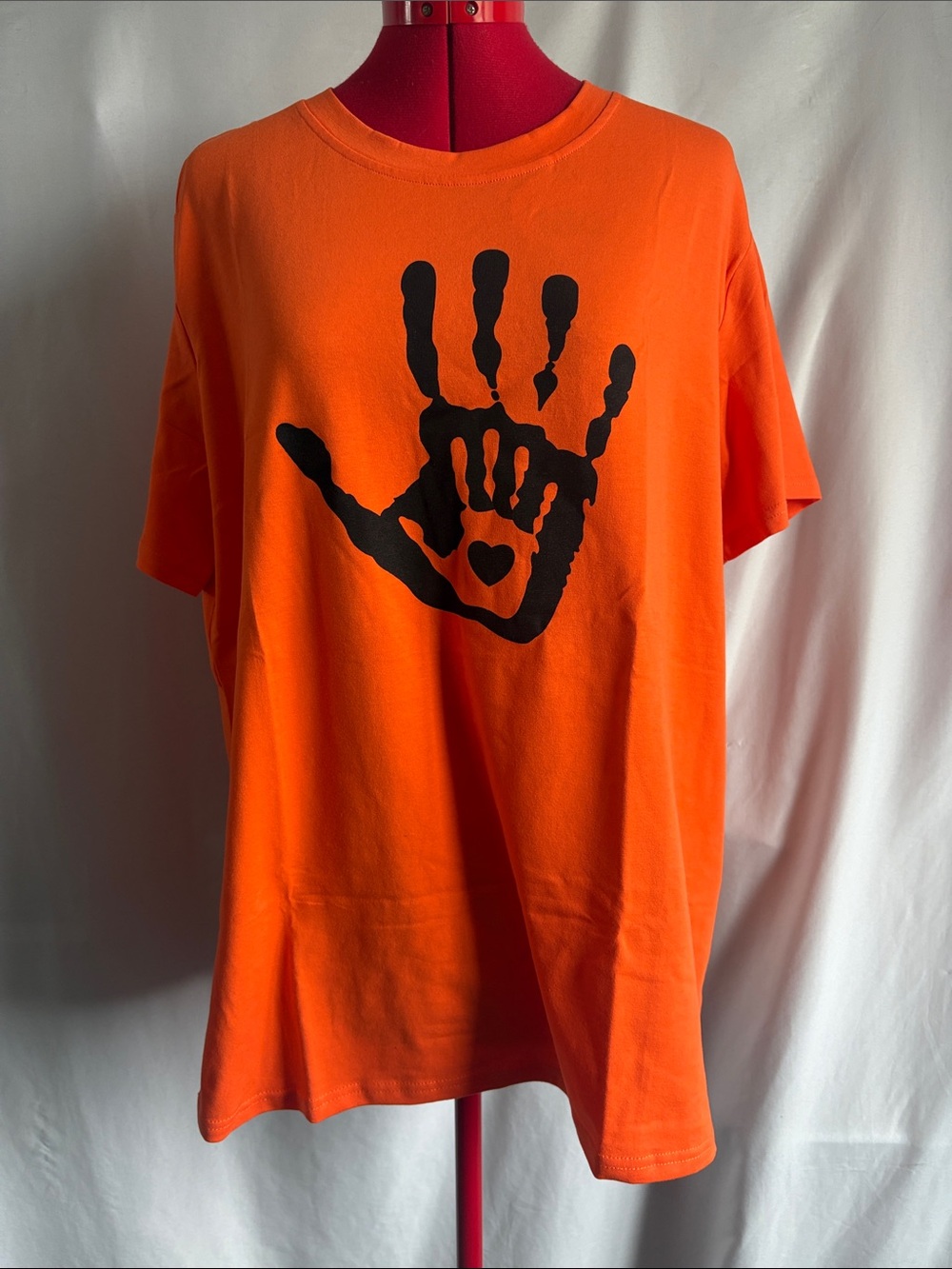 Women's Orange Short-Sleeve Tee with Black Handprint Graphic